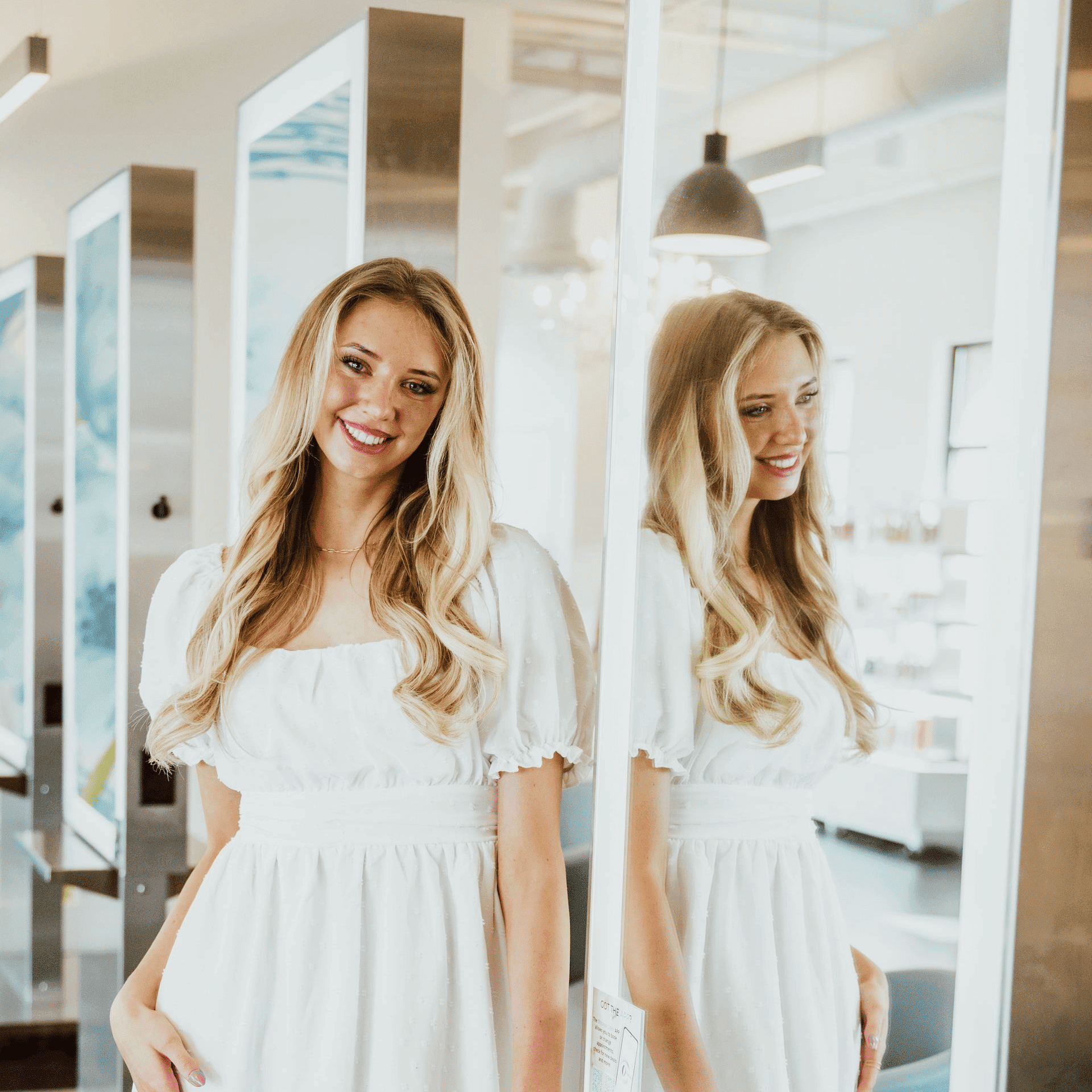 Portrait of Aleah Green, a professional stylist at Ottalaus Salon, showcasing their expertise and style.