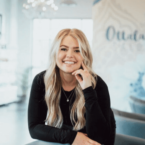 Portrait of Morgan Carmichael, a professional stylist at Ottalaus Salon, showcasing their expertise and style.