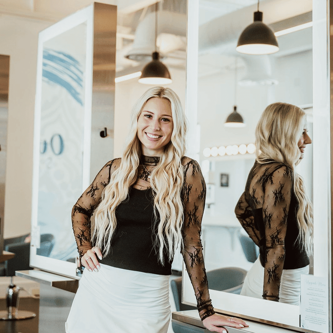 Portrait of Autumn, a professional stylist at Ottalaus Salon, showcasing their expertise and style.