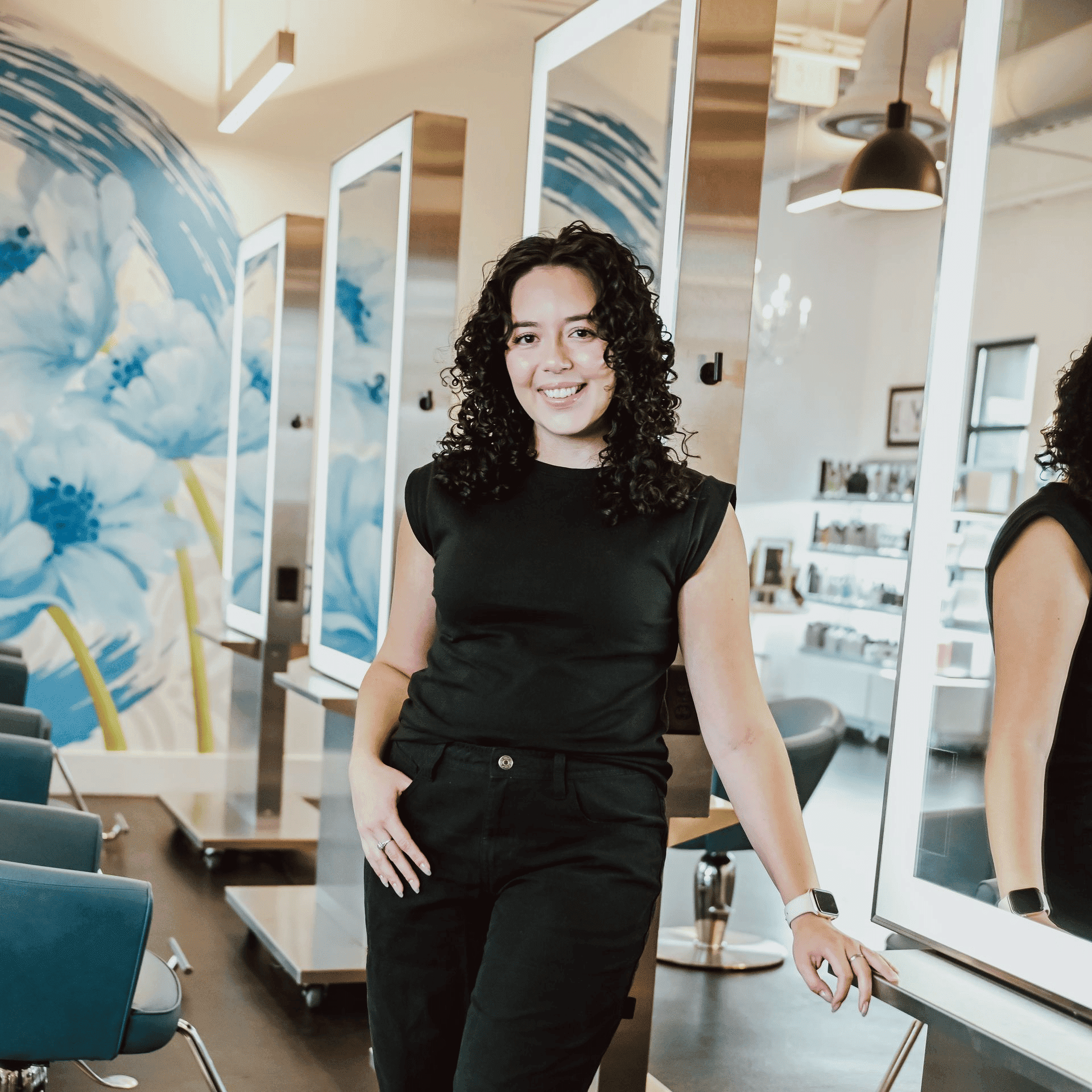 Portrait of Fiona Shaffer, a professional stylist at Ottalaus Salon, showcasing their expertise and style.