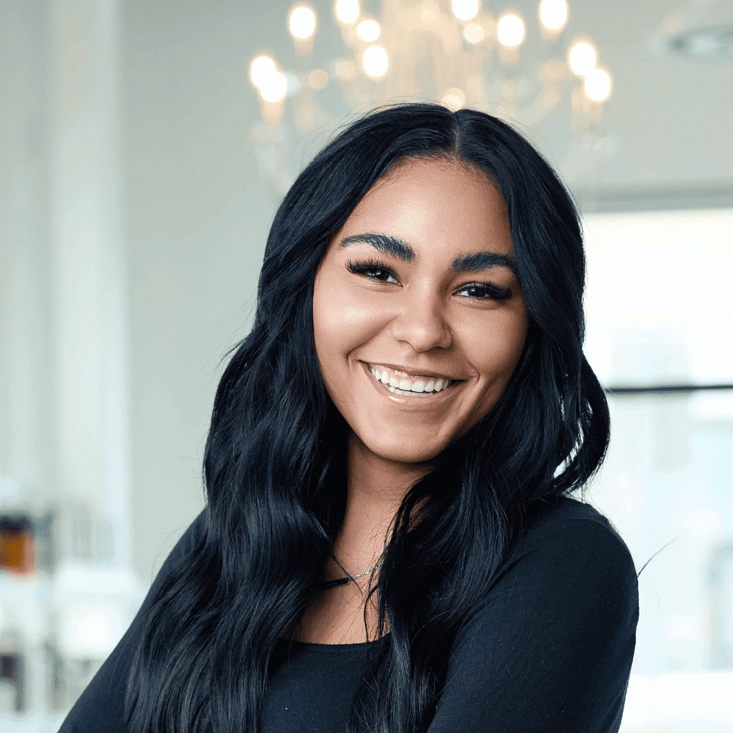 Portrait of Kendree, a professional stylist at Ottalaus Salon, showcasing their expertise and style.